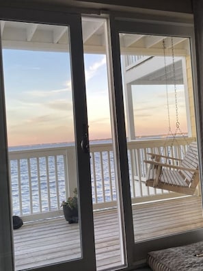 Large balcony doors bring the beauty of the bay inside.  With Perdido Bay only a few yards away, paradise awaits.