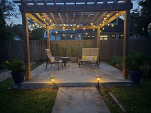 We've just added the blue adirondack rockers you see in the daytime photo!