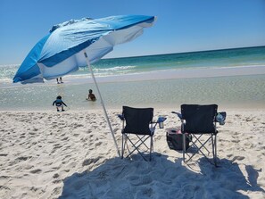 You'll have two beach chairs, an umbrella, a cooler, and 2 beach towels in your suite to use.