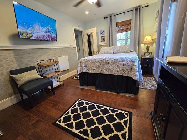 The rolling cart can be moved for storage or a bedside table. Floors are quality hand rolled hard wood. 