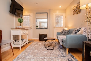 Living room, has to exits to the outside.