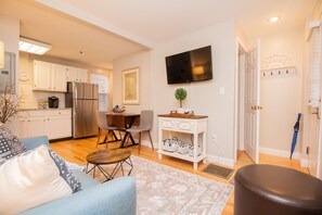 Living room, door shown on the right goes to the basement with futon and half bath