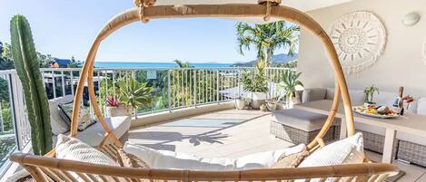 Hanging basket chair with incredible ocean views