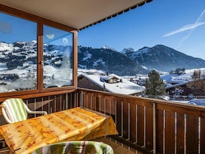 Sky, Table, Property, Snow, Furniture, Window, Mountain, Tableware, Nature, Building