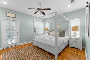 Primary bedroom with king bed, 65in tv, private bathroom