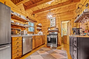 
Fully stocked kitchen! Spices, cooking spray, air fryer and cookbook, oh my!  