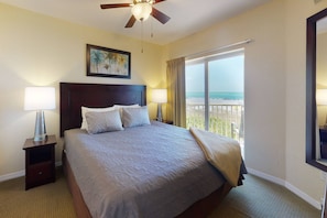 Master Bedroom with King Bed, Ensuite Bathroom and Balcony Access