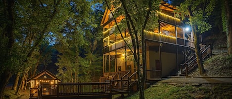 Enjoy the beautiful string lights on your 3 story cabin while you stay.