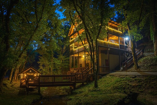 Enjoy the beautiful string lights on your 3 story cabin while you stay. 