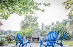 Patio with outdoor fireplace
