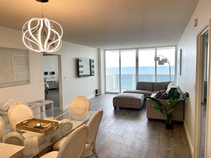 living room with sliding door ocean view