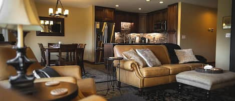 Living room with a view of the dining room and kitchen