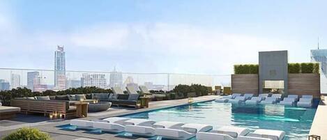 Seasonally heated Rooftop pool with free cabanas & sun loungers