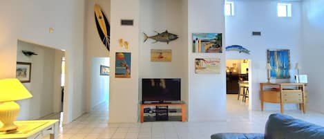 WELCOME TO THIS BEAUTIFUL BEACHSIDE POOL HOME .
VAULTED CEILINGS, SPACIOUS