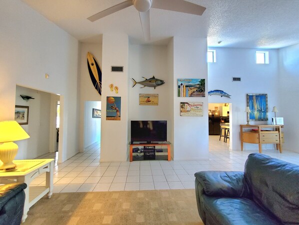 WELCOME TO THIS BEAUTIFUL BEACHSIDE POOL HOME .
VAULTED CEILINGS, SPACIOUS 