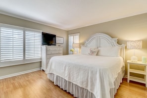 Master Bedroom with Gorgeous White Bedding and a Flat Screen Smart TV (King Bed)