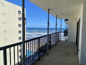 Large balcony with ocean and river views.