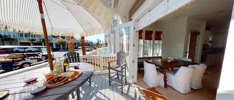 Double French Doors open to let the sea air and sunshine in.  