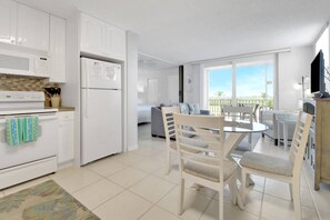 The studio space is efficiently designed to contain an open living, dining, bedroom and kitchen space.