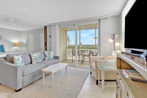 This cozy beach getaway is furnished in an easy style, inviting rest and relaxation.