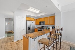 Fully Equipped Kitchen with Additional Seating