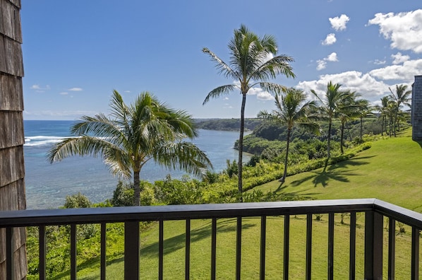 Sealodge E7 oceanfront view from lanai | Sealodge Princeville Ka - Sealodge E7 has incredible ocean views from the private balcony lanai! Sit outside and take in the sight of the North Shore stretching into the distance, and enjoy the cool ocean breezes on your face.