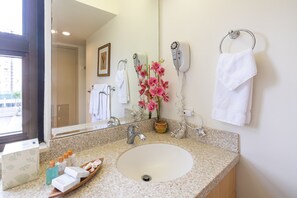 Bathroom with vanity and cabinet