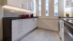This kitchen will provide you with all the amenities necessary for the preparation of a warm and delicious homemade meal #airbnb #airbnblisbon #portugal #pt #lisbon