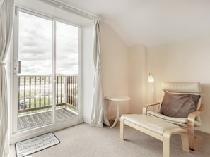 Access to balcony from living area | Tidal Watch - Riverside Cottages, Alnmouth