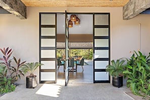 Large foot pivoting door front door entrance, Welcome to Paradise!