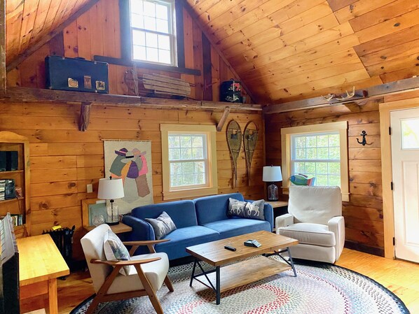 Welcome to Deer Creek Cabin in Sprucewold! (The living room and front door)
