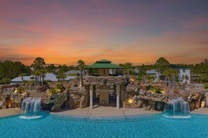 5 min walk to a huge resort-style community pool with waterfalls & fountains.