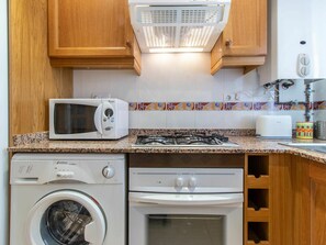 Brown, Cabinetry, Countertop, Property, White, Washing Machine, Laundry Room, Home Appliance, Kitchen, Interior Design