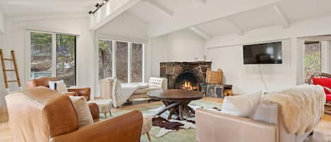 Living Room with Fireplace and TV