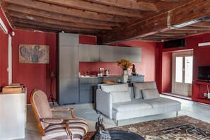 The living room with the kitchenette