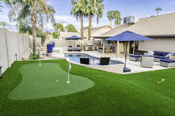 Relaxing patio and heated pool for all to enjoy