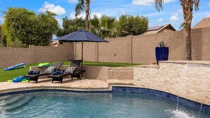 Backyard loungers with putting green