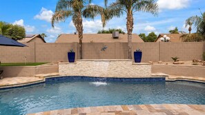 Heated pool with fountain