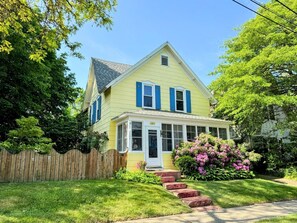 Take in the Views of Michigan Avenue from the Enclosed Front Porch