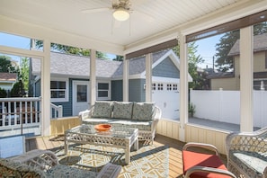 Relax in the screened porch right off the kitchen