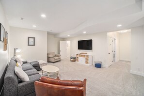 Elevate Movie Nights in Lake Affect`s Lower Level Family Room