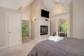 A True Masterpiece - The Upper Level Master Queen Suite Features a Soothing Fireplace and a Flatscreen TV