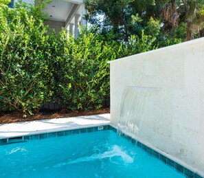 Relax Pool side with the sounds of relaxation of the water fall feature