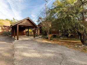 Covered carport and parking for 3-4 vehicles