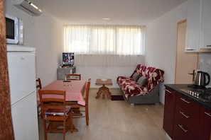 Living room, dining area, kitchen