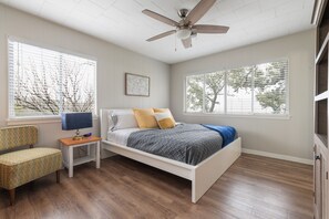 Master bedroom with closet and half bath ensuite.