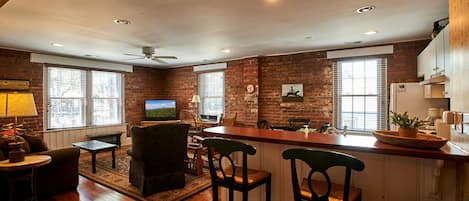 Charming apartment with exposed brick walls