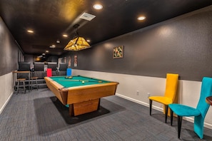 Relax and watch a movie or enjoy a fun game of billiards!