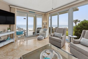 Living Room - Your Blue Swell Vacation Rental has endless views at The Crescent from your living room!