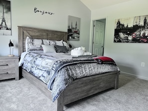 "European" themed master bedroom with en-suite and plush Pillowtop Queen bed